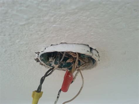 ceiling fan junction box in dropping out of ceiling|outlet box acceptable for fan support.